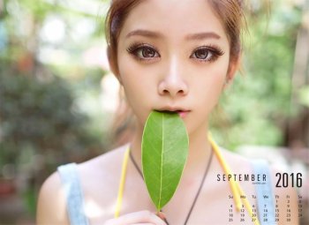 咬着树叶的清纯美少女妹子小酥胸的性感写真高清图片壁纸