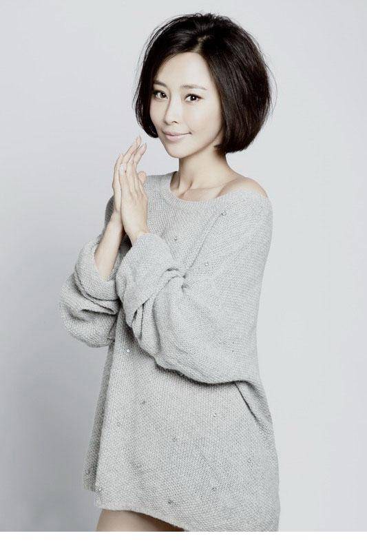 大陆短发女明星张曦文初春写真图片