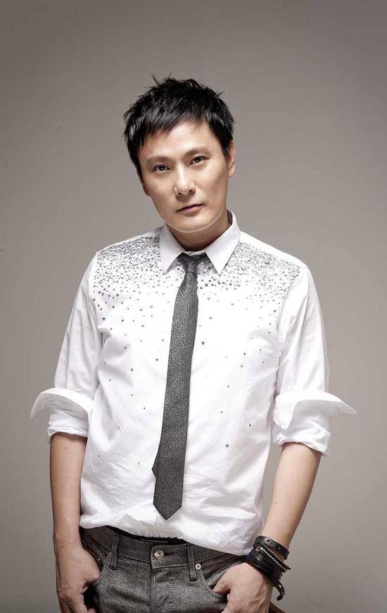 情歌王子张信哲青涩年华写真精选