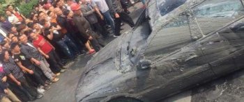 河里捞出15年前失踪轿车 车内发现2具尸骨