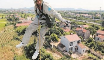 胡洪炜：全球特高压带电作业第一人