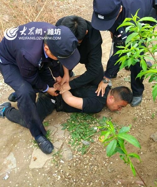 安丘一网上逃犯见到民警拔腿就跑 一公里后束手就擒